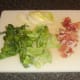 Sweetheart cabbage, bacon and onion ready for sauteeing
