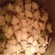 Add your onion, pepper, garlic and red pepper flakes if you are using them. Allow this to simmer for a few minutes.