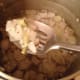 Start layering the radishes and the onion mixture from the pan.