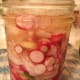 Pour the liquid from the hot pant into the jar leaving 1/2" headspace. You may or may not have some of the liquid left over.