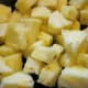 Cut pineapple into large chunks.