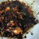 11. Mix them thoroughly and let the gravy simmer before you add in 2 tbsp. of water. Stir and let the chicken cook in the gravy for another 15 minutes.