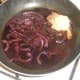 Butter is added to thicken red wine joux