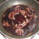 Red wine is added to pan to make joux