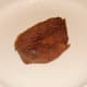 Fried ostrich steak is rested