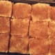 After adding ground cinnamon to the top layer.