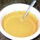 The pumpkin puree is combined with the condensed milk, eggs, and spices.