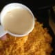 Add the evaporated milk. Just pour it right over the top. Salt and pepper to taste.