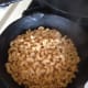 Boil the pasta according to package directions and put 1/2 of the cooked pasta into a baking safe dish.