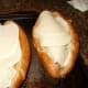 Top each sandwich with 3 slices provolone, tucking the overlap into the hoagie rolls.
