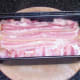 Cooked meatloaf is briefly allowed to rest in tin