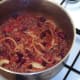 Chilli is brought to a gentle simmer