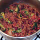 Broccoli is carefully stir folded through chilli