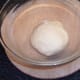 Kneaded pizza dough is left to rise