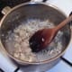Sweated onion and mushroom is left to cool slightly