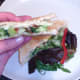 Biting in to a broccoli and bacon cheese toastie