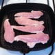 Starting to griddle chicken strips