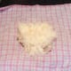 Potato grated on to tea towel