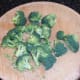 Broccoli is carefully cut in to small florets