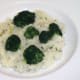 Broccoli florets are arranged on mash