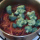 Broccoli is added to chilli