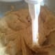 The wet ingredients in the dough should have a light and airy look to them.