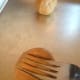 Lightly press on the fork to create the first indention.