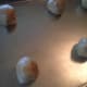 Roll teaspoon size dough balls and place a couple of inches apart on an ungreased cookie sheet.