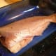 Preheat your oven to 375 degrees. Arrange the fillets or the whole catfish in a baking dish. Season with salt and pepper to your taste.