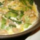 Add egg mixture to veggies. Let set slightly, then scramble lightly.