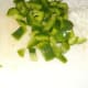 Chop onions, green peppers, and mushrooms