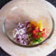 Main salsa ingredients added to a bowl