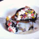 Enjoying salsa and mozzarella stuffed mushroom with bruschetta