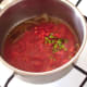 Tomatoes and chillies are added to spiced onions