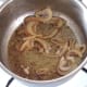 Onions are briefly sauteed in spiced oil