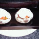 Mozzarella slices laid on roasted stuffed mushrooms