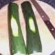 Zucchini skin is shaved to ensure balance on roasting tray