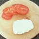 Tomato and mozzarella is sliced