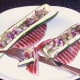 Enjoying pineapple salsa stuffed zucchini boats with gammon steaks