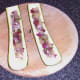 Zucchini boats are stuffed with pineapple salsa