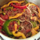 Spiced beef ingredients are combined and brought to a simmer