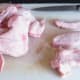 Chopping fresh chicken wings