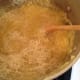 Stir in the parmesan cheese so it will melt. At this point, the polenta is finished and you can set it aside. Keep the lid on the pot and it will not get cold for a while.