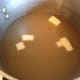 Pour the broth into a saucepan (I used a 5qt. pan) and add 1 tablespoon of butter.