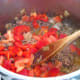 Adding capsicum and tomato.