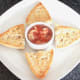 Tomato, basil and oregano potted crayfish tails with toasted cheesy bread rolls