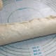 Fold over onto itself in thirds, pinch to seal