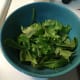 You can either put the greens and other vegetables at the bottom of the bowl and put the noodles and broth on top or you can add the veggies on top of the noodles and broth.