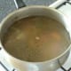 Lamb stock is left to partly cool