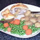 Cutting in to bacon and leek stuffed chicken thigh en croute